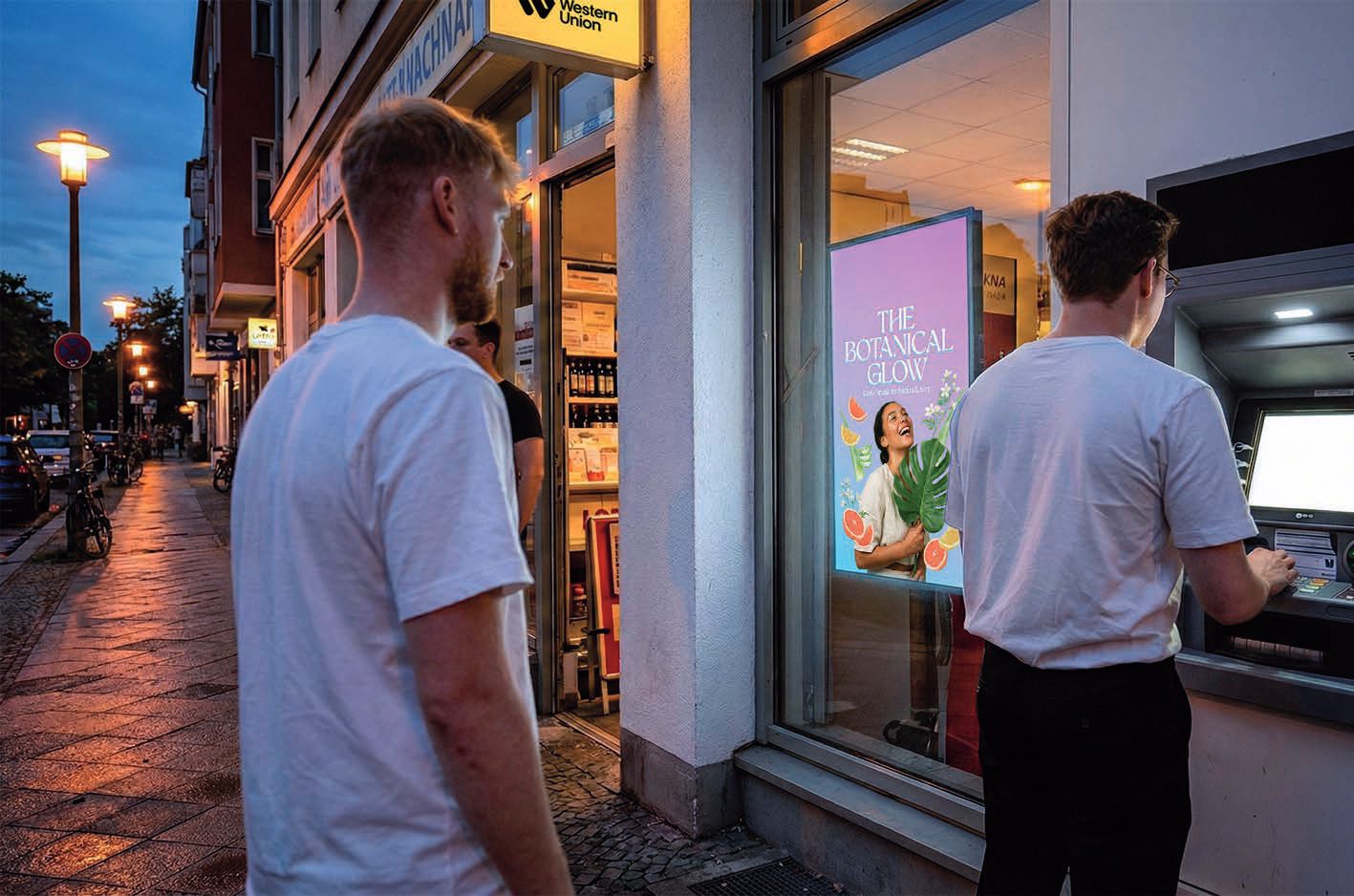 DOOH screen in a Späti window in Berlin-Neukölln — ethno advertising at eye level